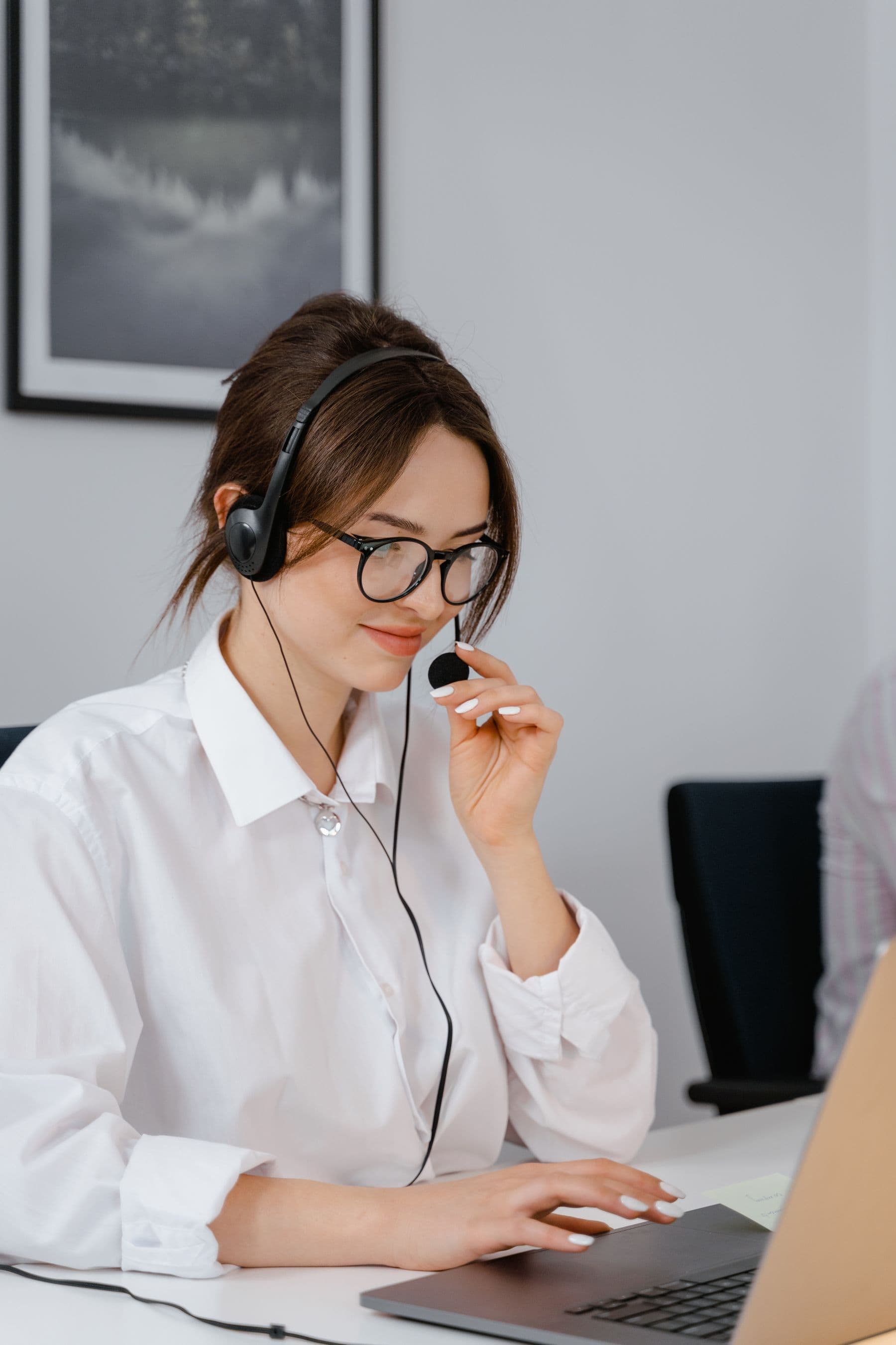 Support agent wearing a headset